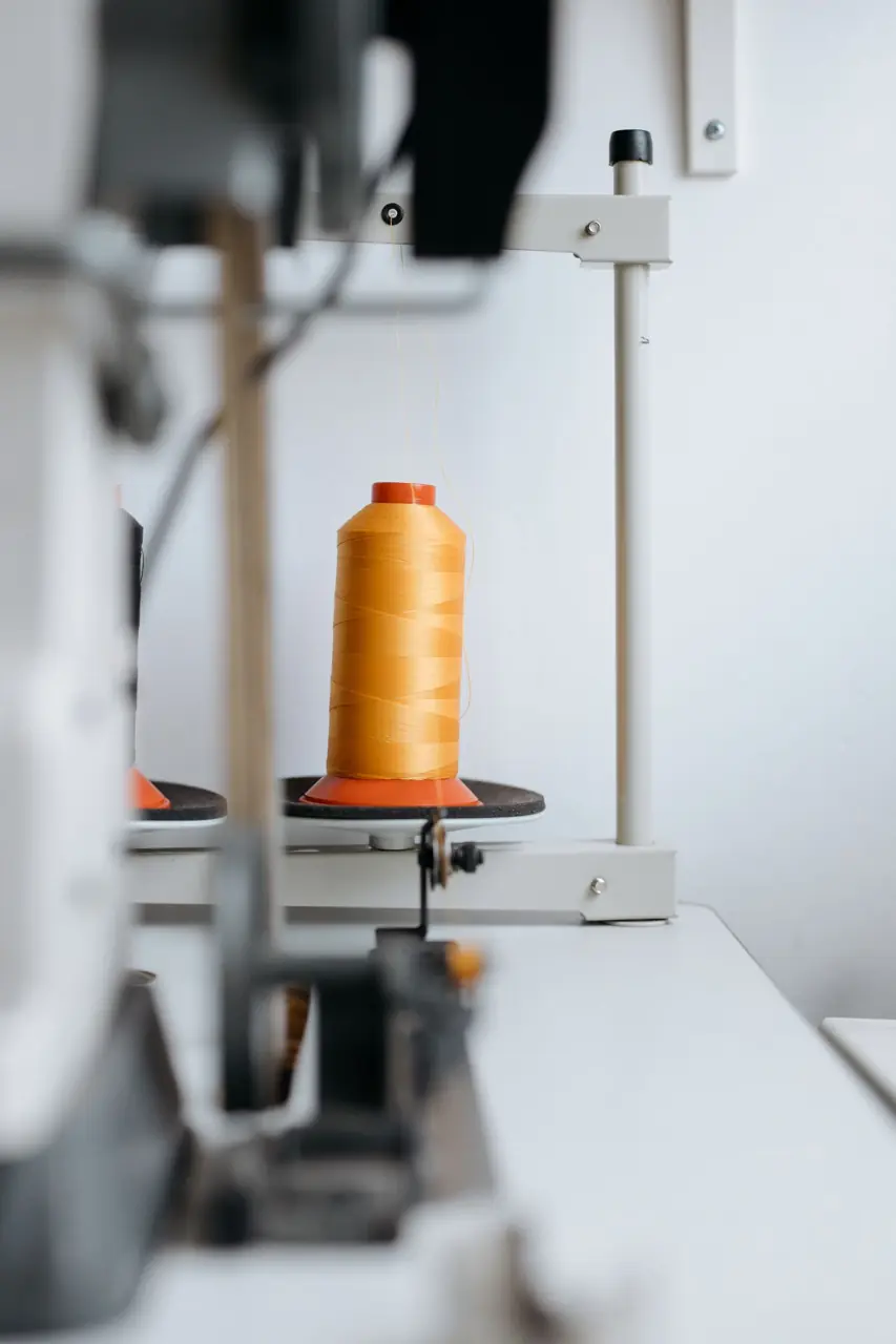 Spool of thread on a sewing machine